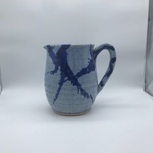 Decorative blue paint splatter pitcher